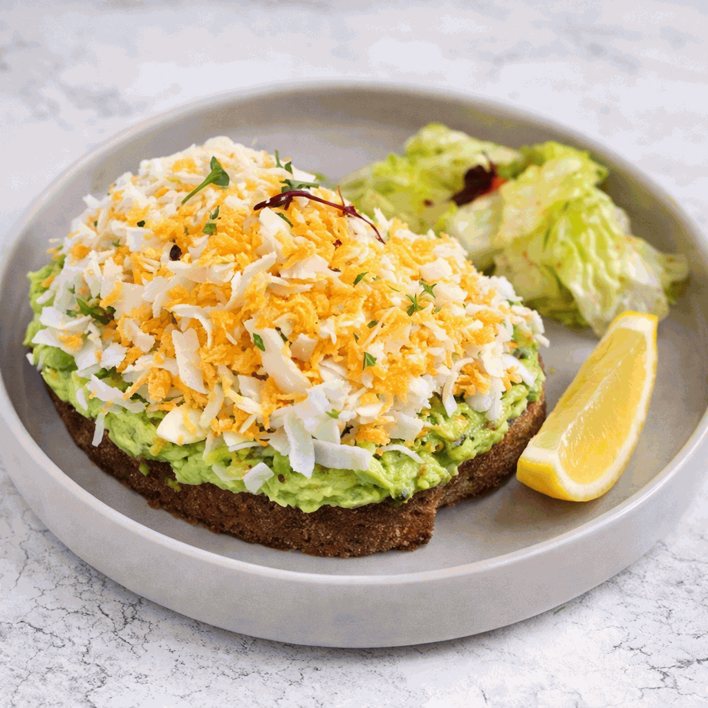 Avocado with grated boiled eggs